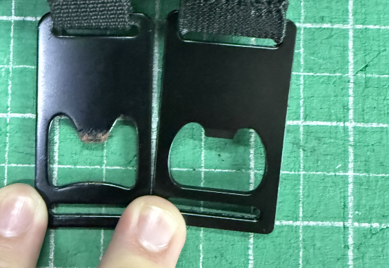 Bottle opener hardware quality inspection showing defect versus approved sample