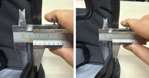Vernier caliper quality check on custom drink carrier during production