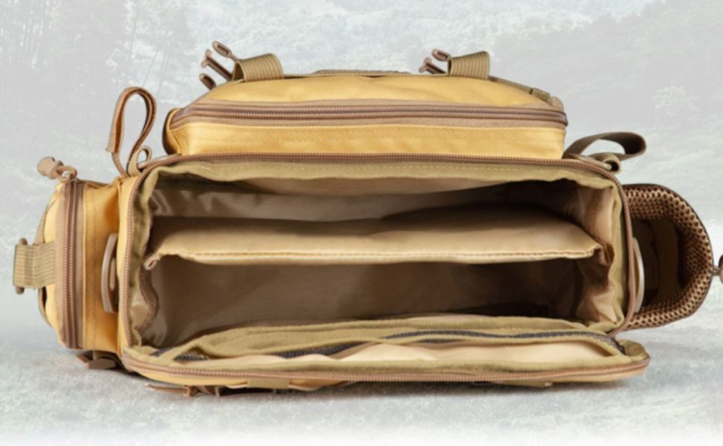 Empty interior view of Nice Bags tan fishing tackle bag showing large main compartment