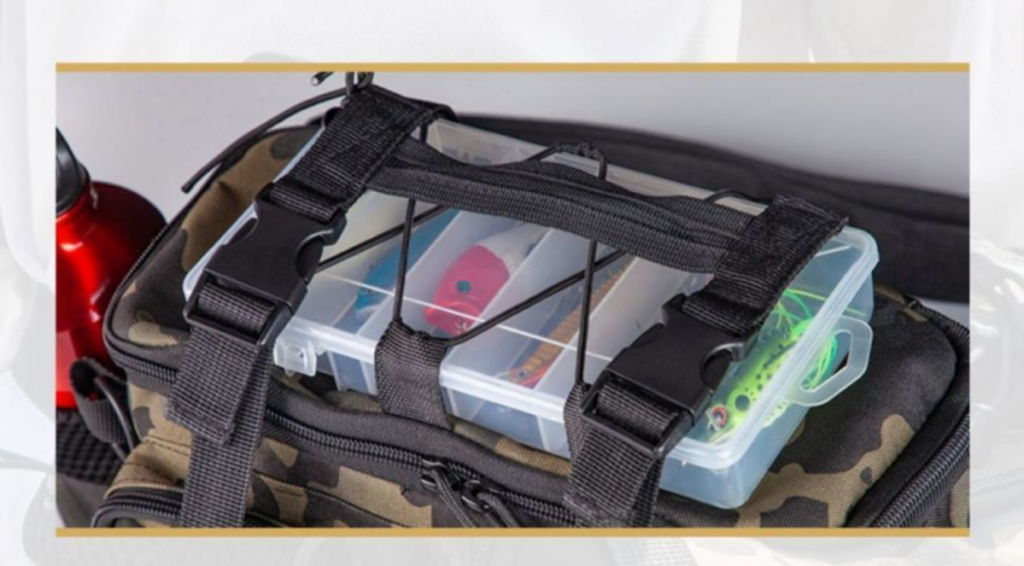 Top lid straps securing lure box on top of the Nice Bags fishing tackle bag