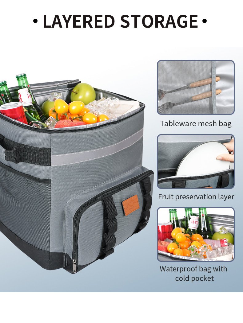 Layered interior storage in insulated cooler bag with tableware mesh pocket