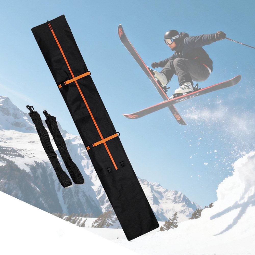 Nice Bags black snowboard bag with orange compression straps and skiing action background