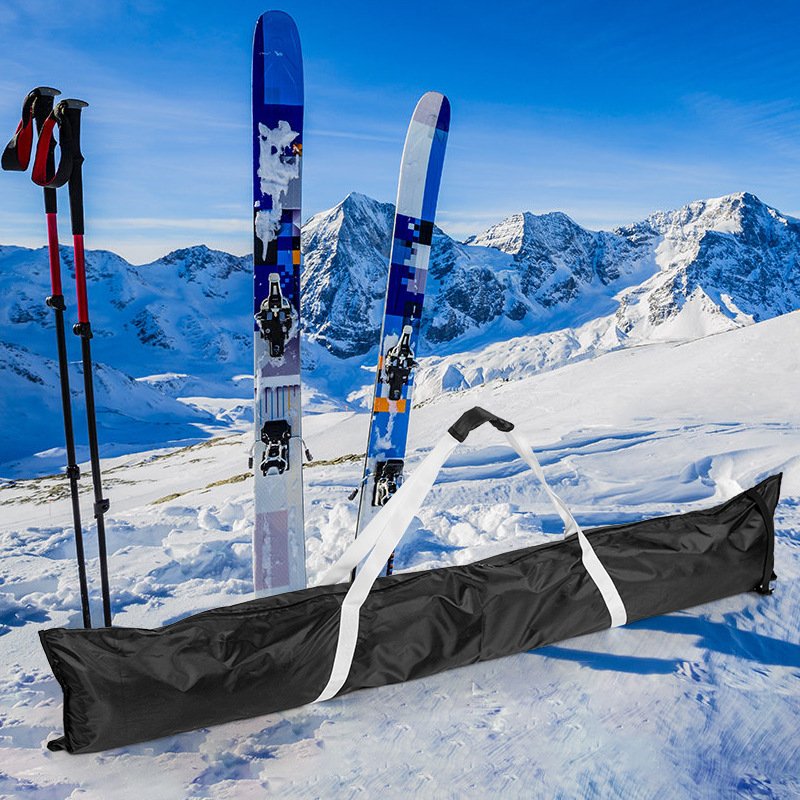 Nice Bags black ski bag with white webbed handles set against snowy ski resort background