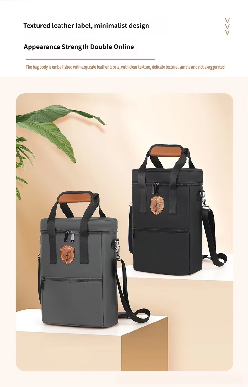 gray and black bags on staged shelf with leather label close-up