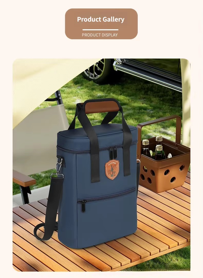 navy bag on outdoor wooden table beside picnic basket