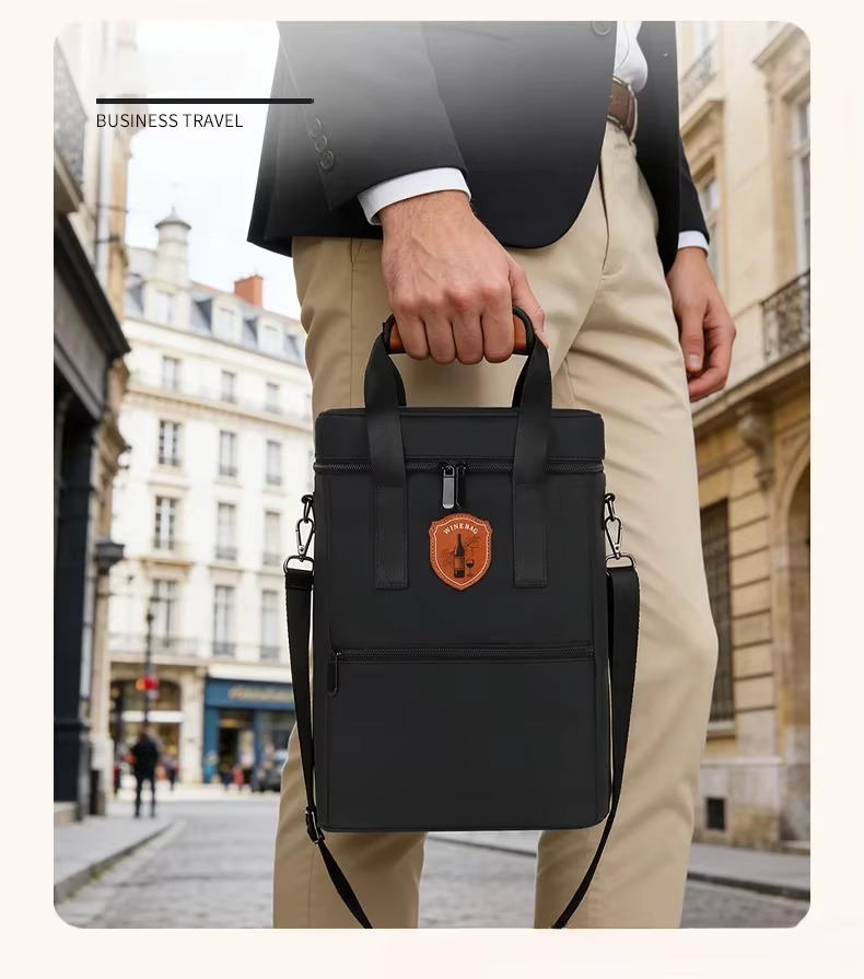 man carrying black bag by handle on city street business travel caption