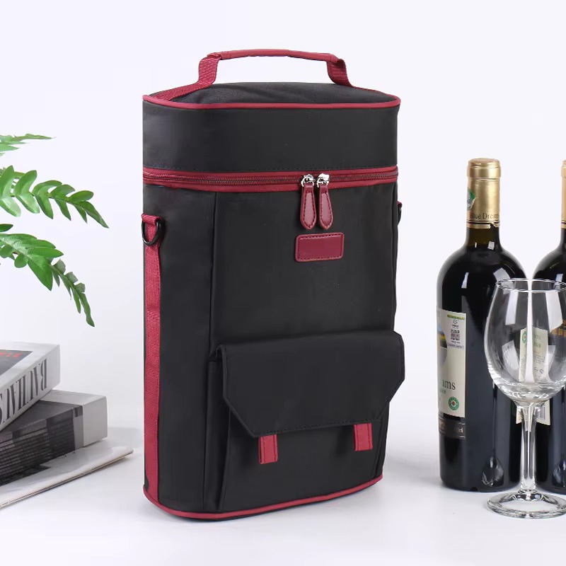 black red-piped bag front view beside wine bottle and glass