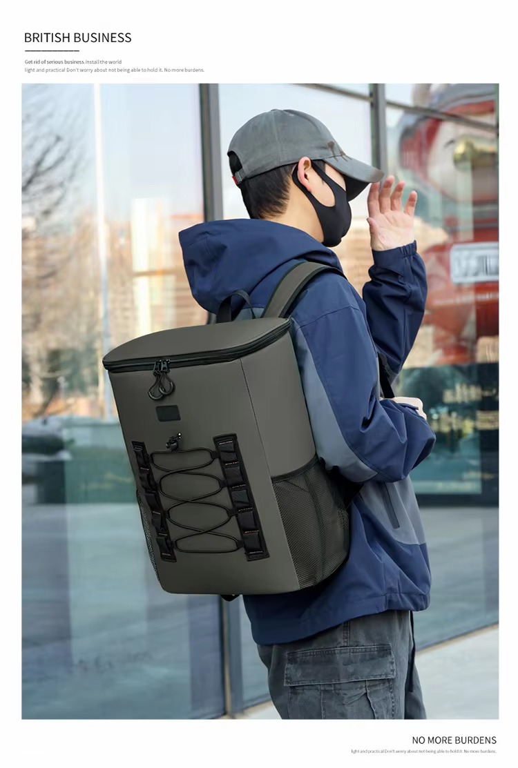 man wearing olive green cooler backpack on one shoulder, side view