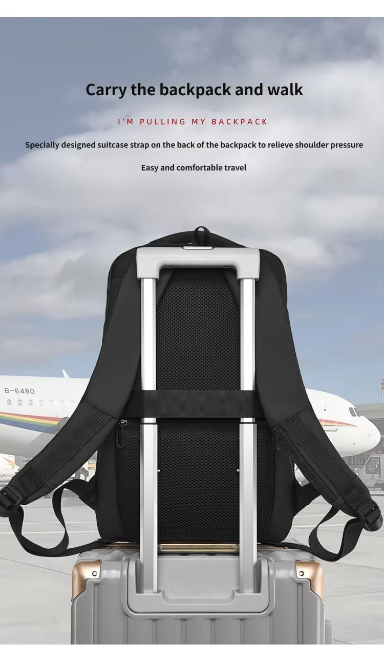 backpack mounted on rolling luggage handle via rear strap