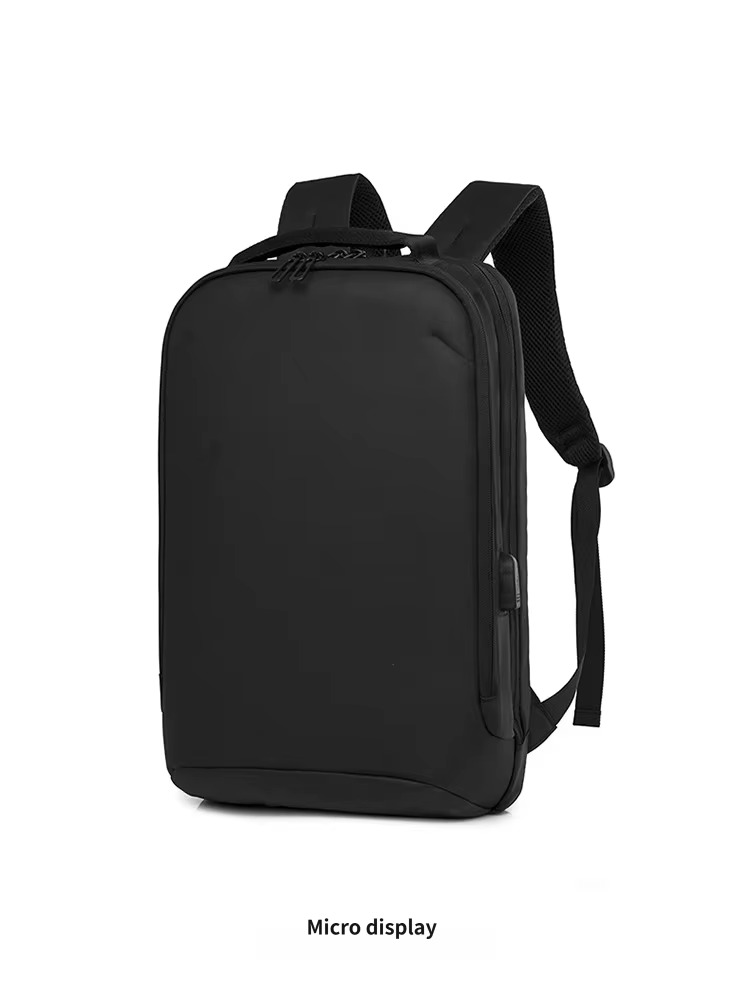 micro side display of black backpack showing USB port