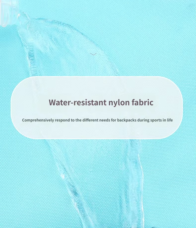 close-up of water droplet on teal water-resistant nylon fabric