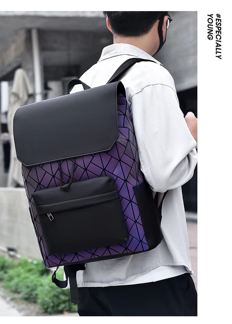 model wearing the gray colorway backpack, viewed from behind
