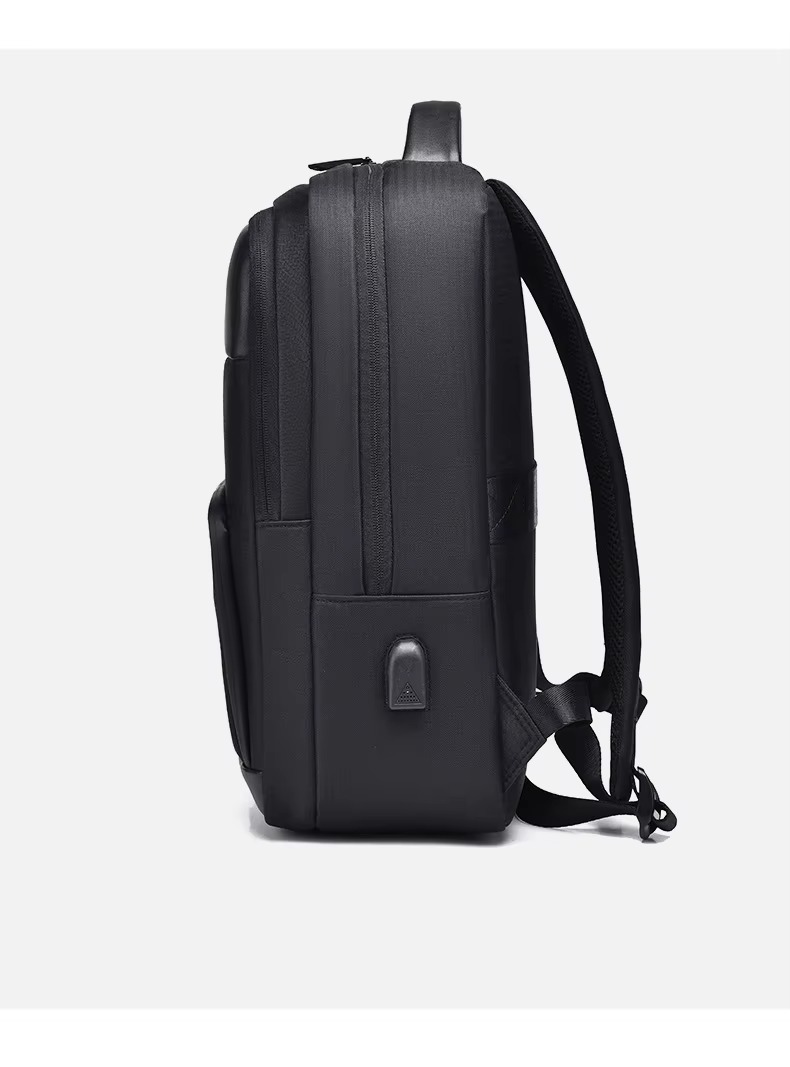 side profile view showing the USB port and side pocket