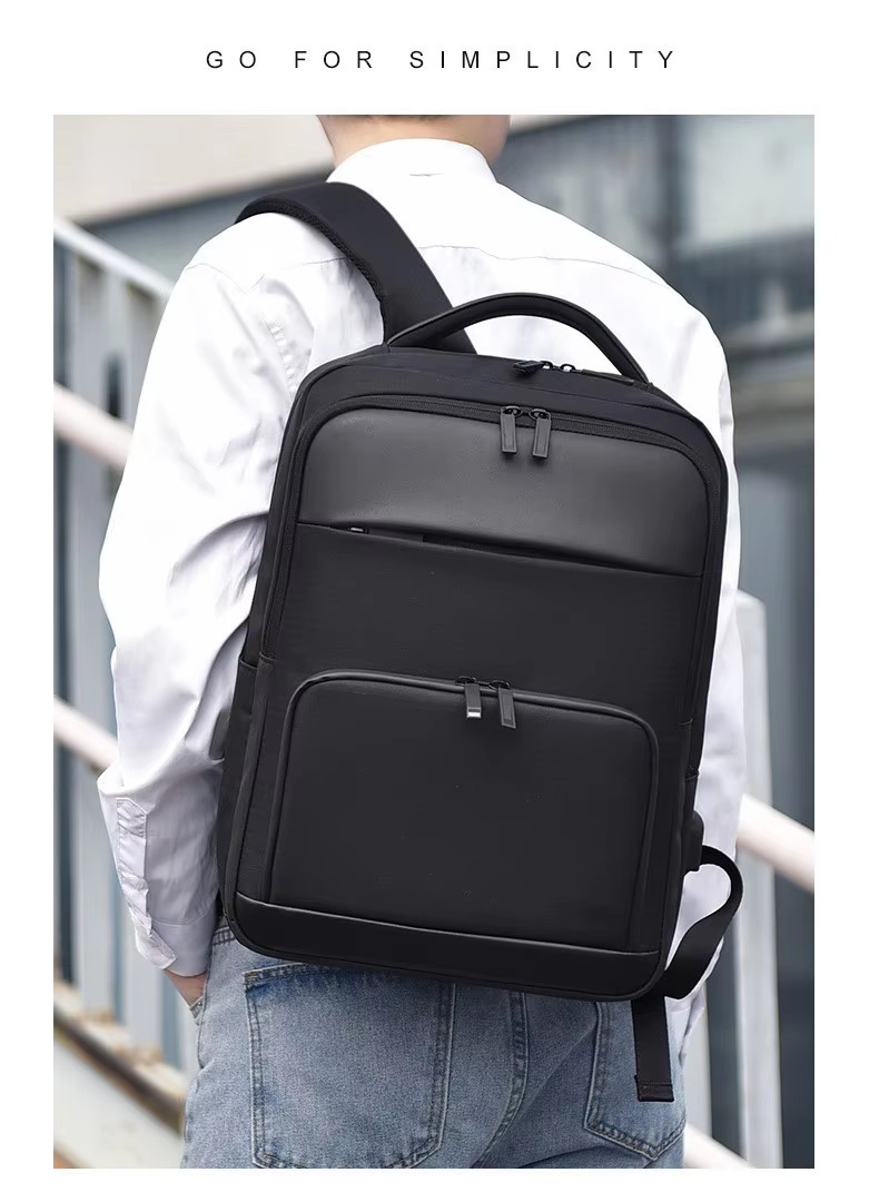 model wearing the backpack, front-facing simple styling shot