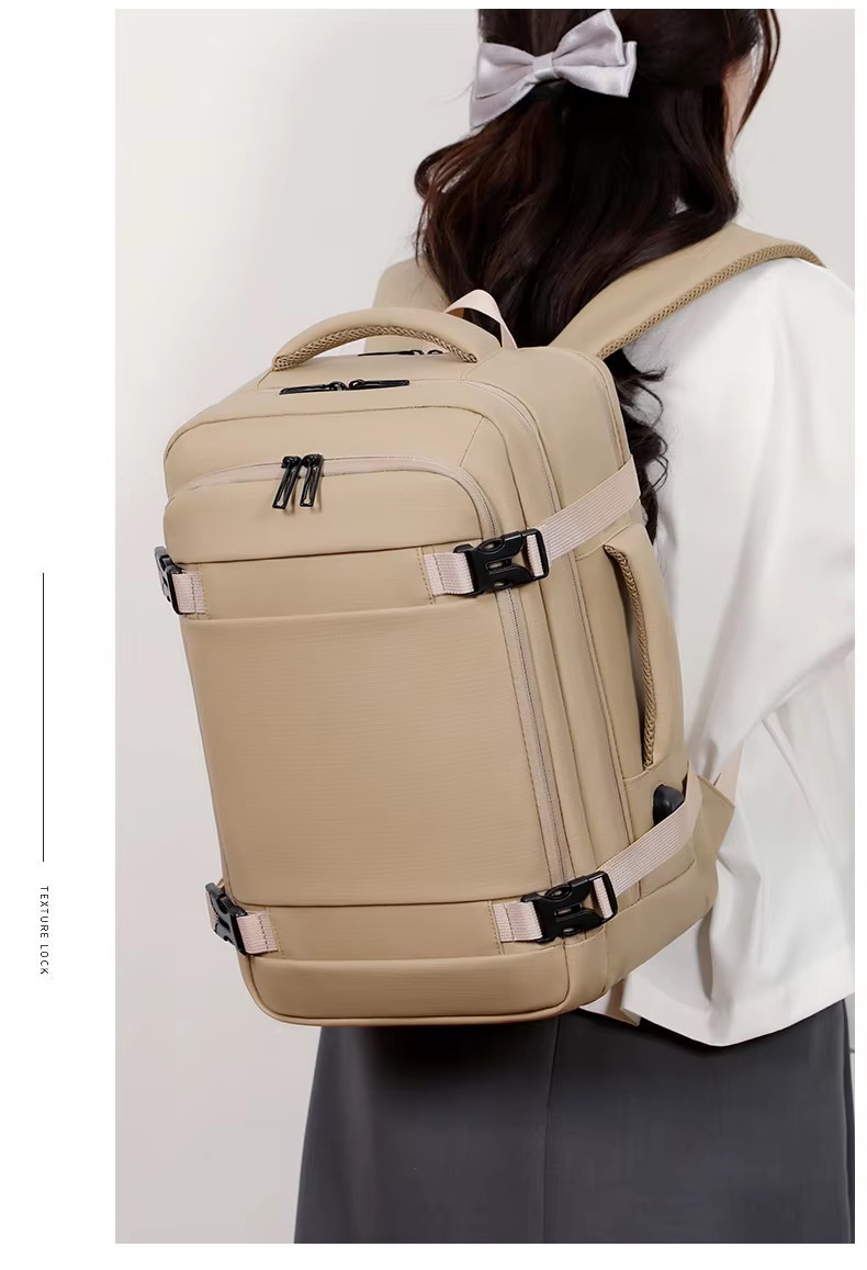 woman wearing khaki backpack over one shoulder