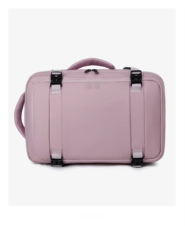 pink backpack top handle and zipper close-up
