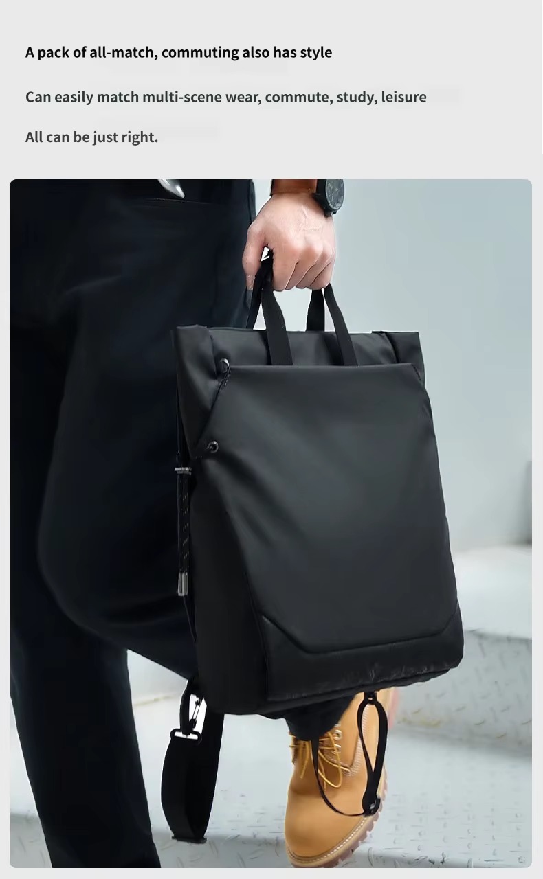 black tote backpack carried by top handle commuting
