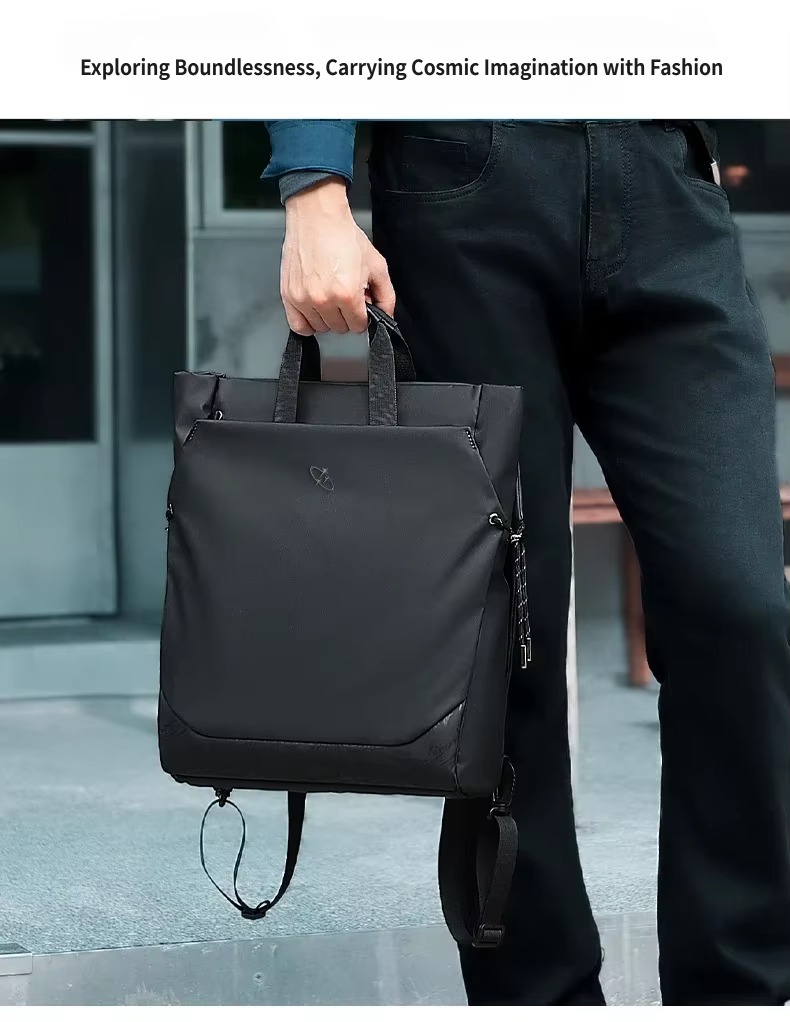 black tote backpack carried by top handle outdoors