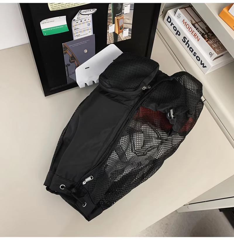 drawstring closure with lock and two mesh pockets close-up