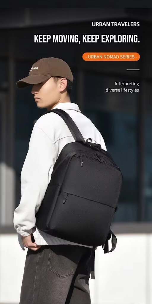 man wearing black backpack outdoors under Urban Nomad Series branding