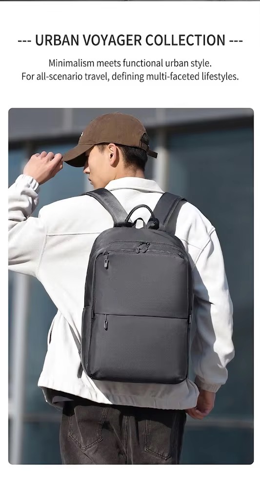 man wearing gray backpack on one shoulder outdoors