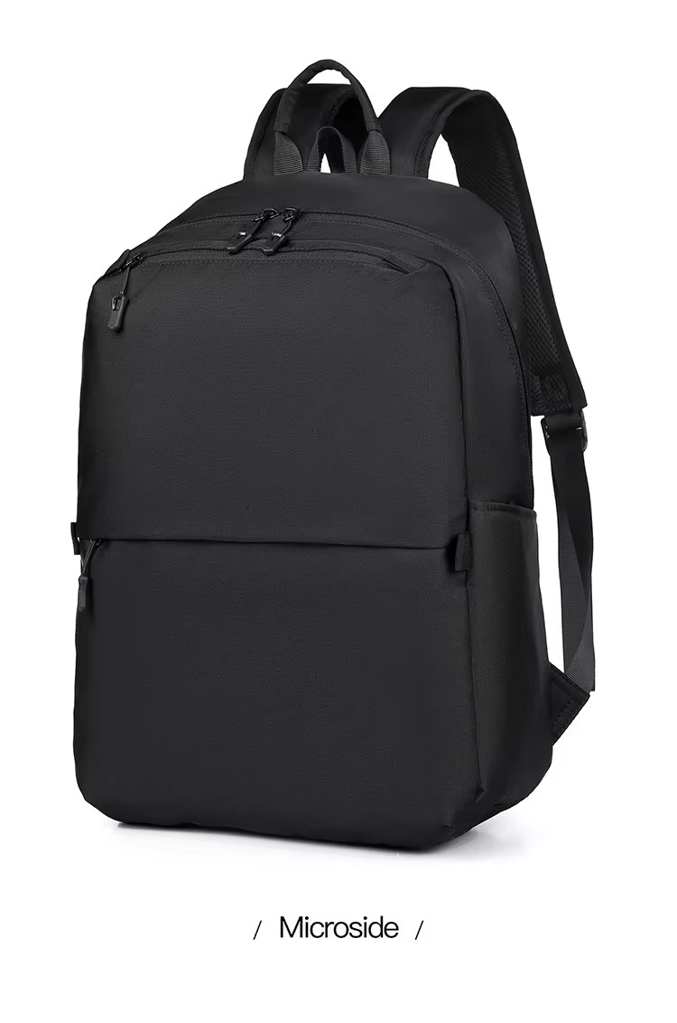 black backpack three-quarter angle view labeled microside