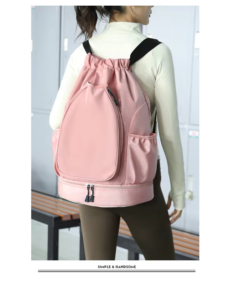 model wearing pink backpack