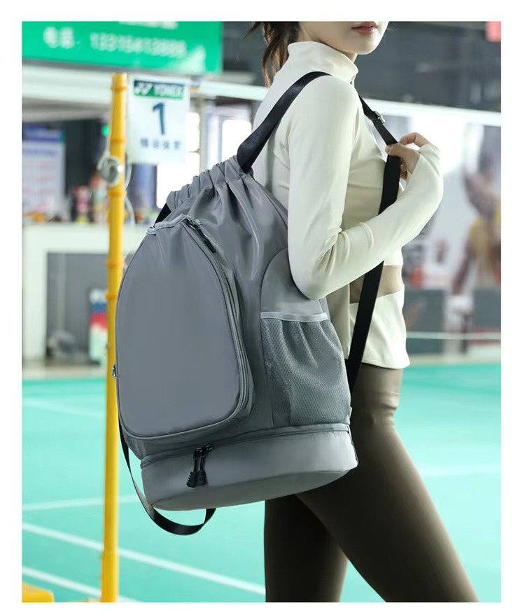 model wearing gray backpack