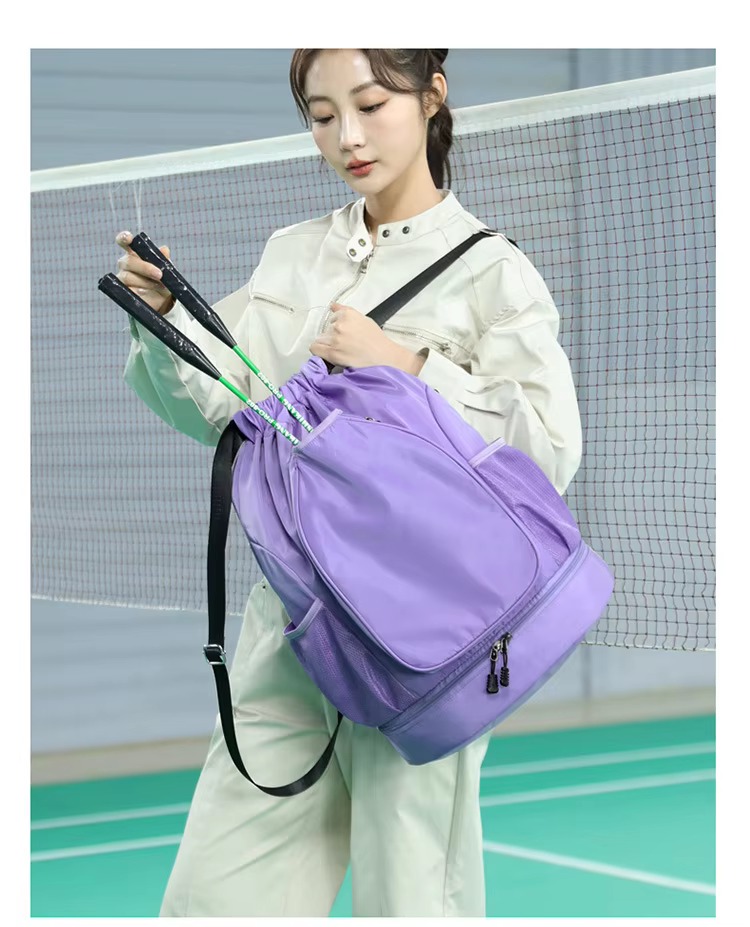 model holding purple backpack with rackets