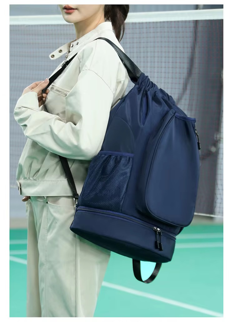 model wearing navy backpack