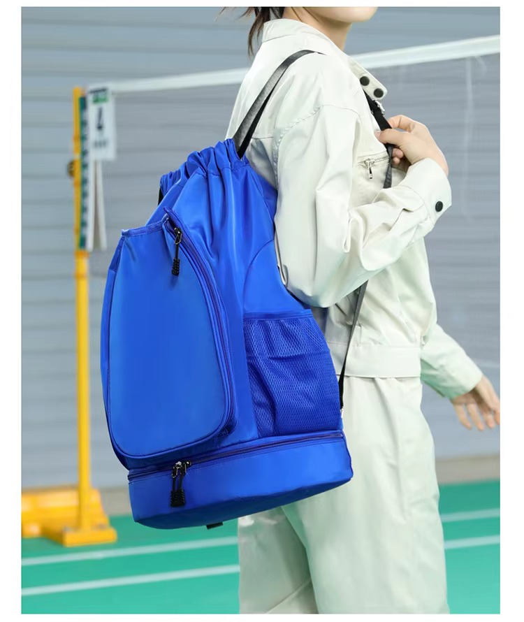model wearing royal blue backpack