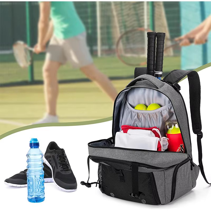 open backpack with balls, towel and bottle beside sneakers