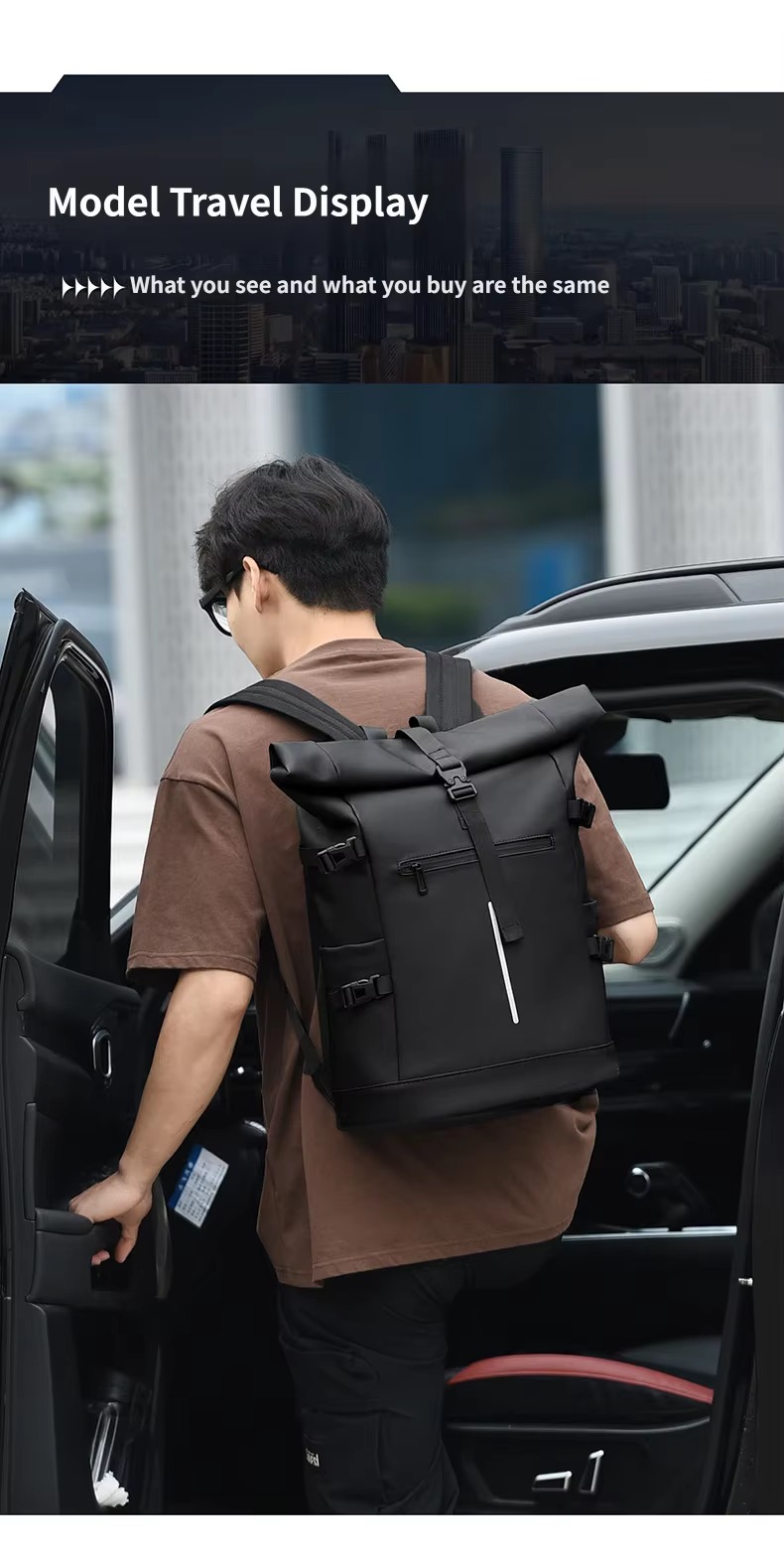 man carrying black roll top backpack by car