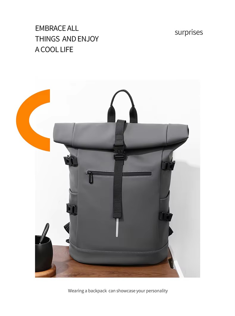 gray roll top backpack with reflective strip
