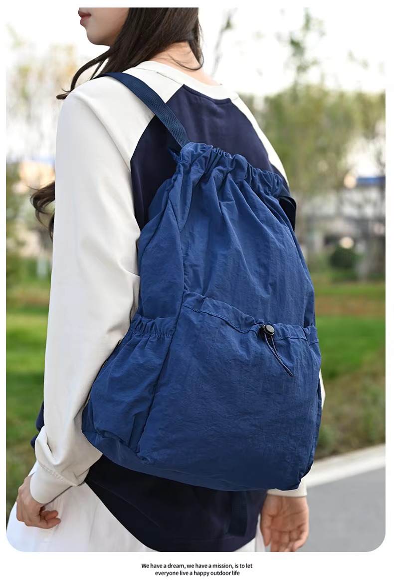 blue backpack side angle
