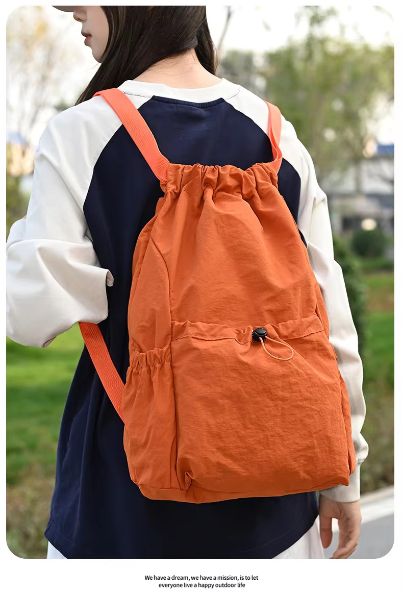 orange backpack back view