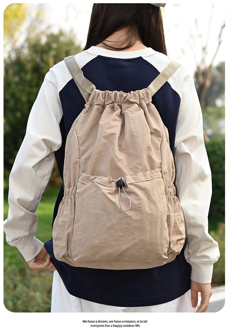 beige backpack back view