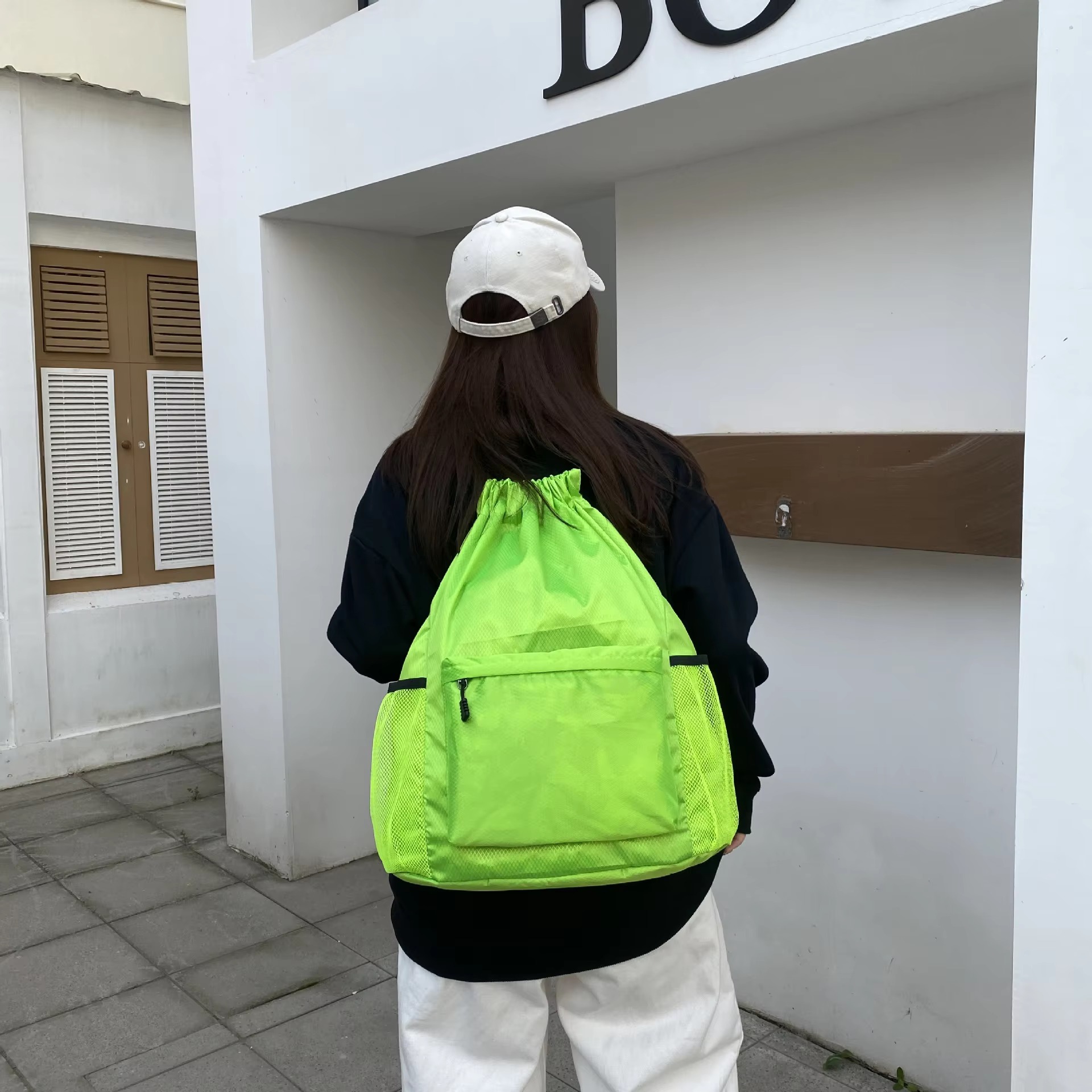 fluorescent green backpack back view