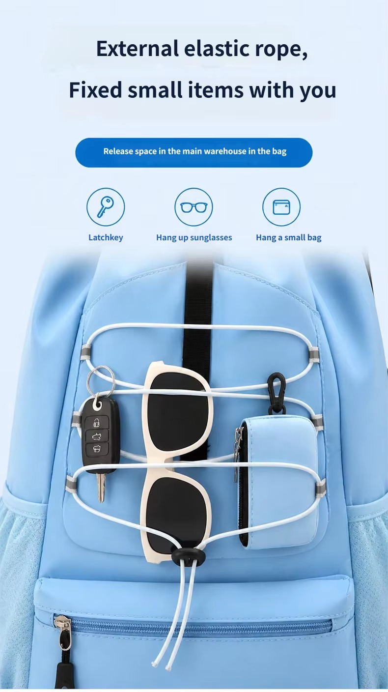 bungee cord holding keys, sunglasses and small bag