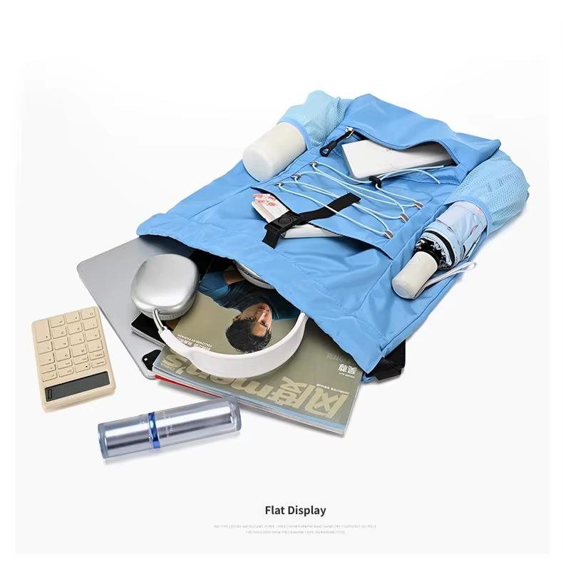 flat view with laptop, magazine and accessories