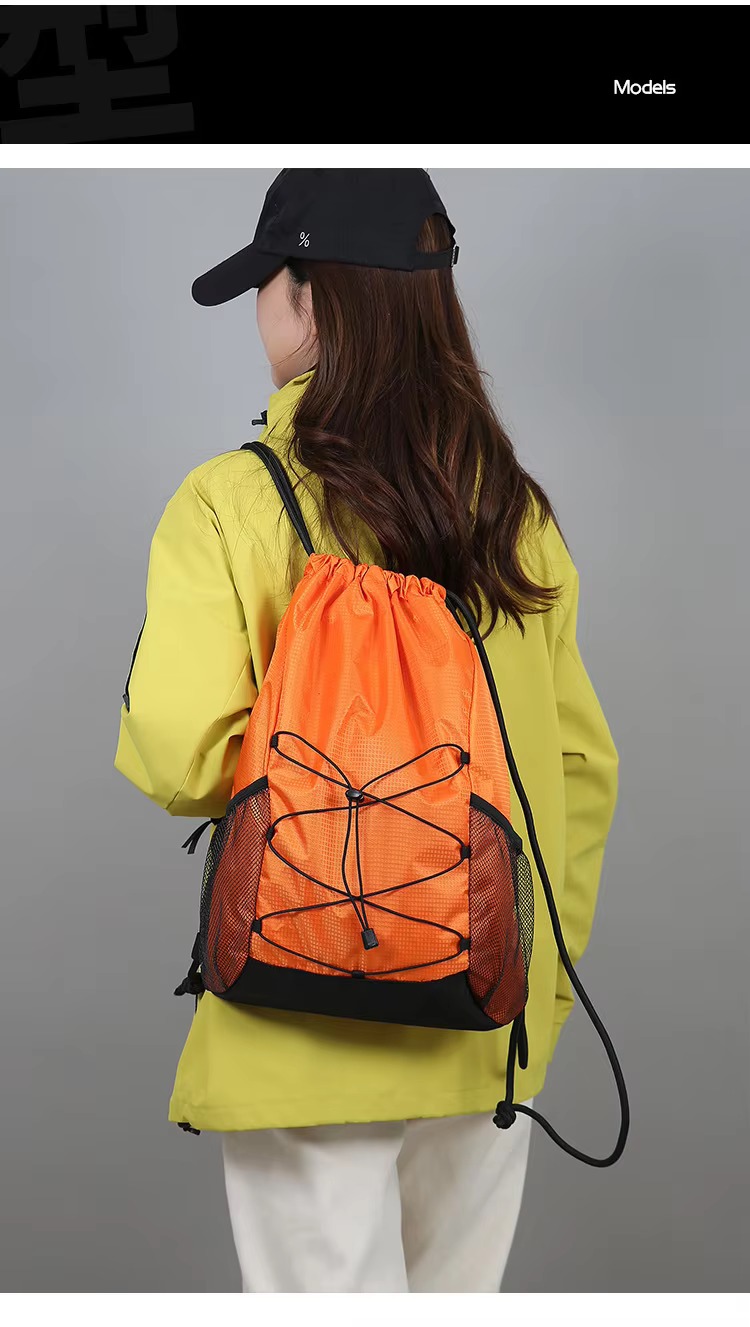 woman wearing orange backpack