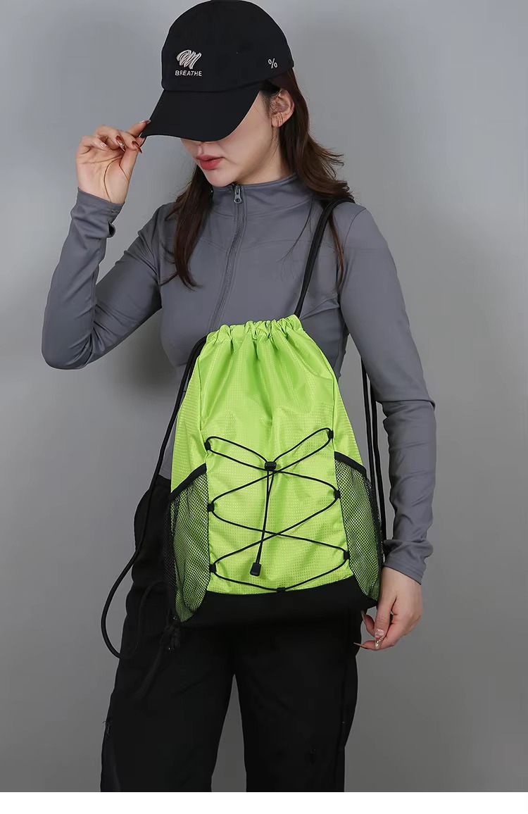 woman wearing fluorescent green backpack