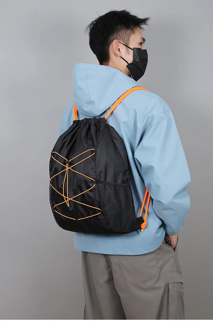 man wearing black backpack