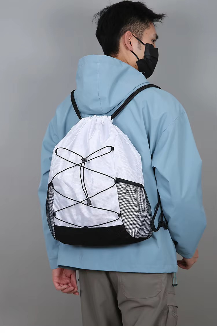 man wearing white backpack
