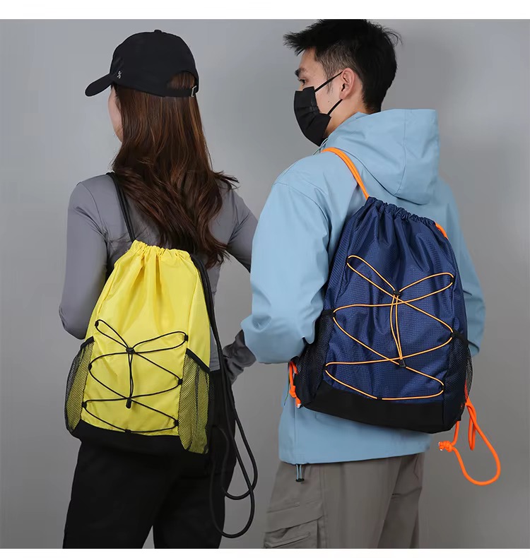 yellow and navy backpacks back view
