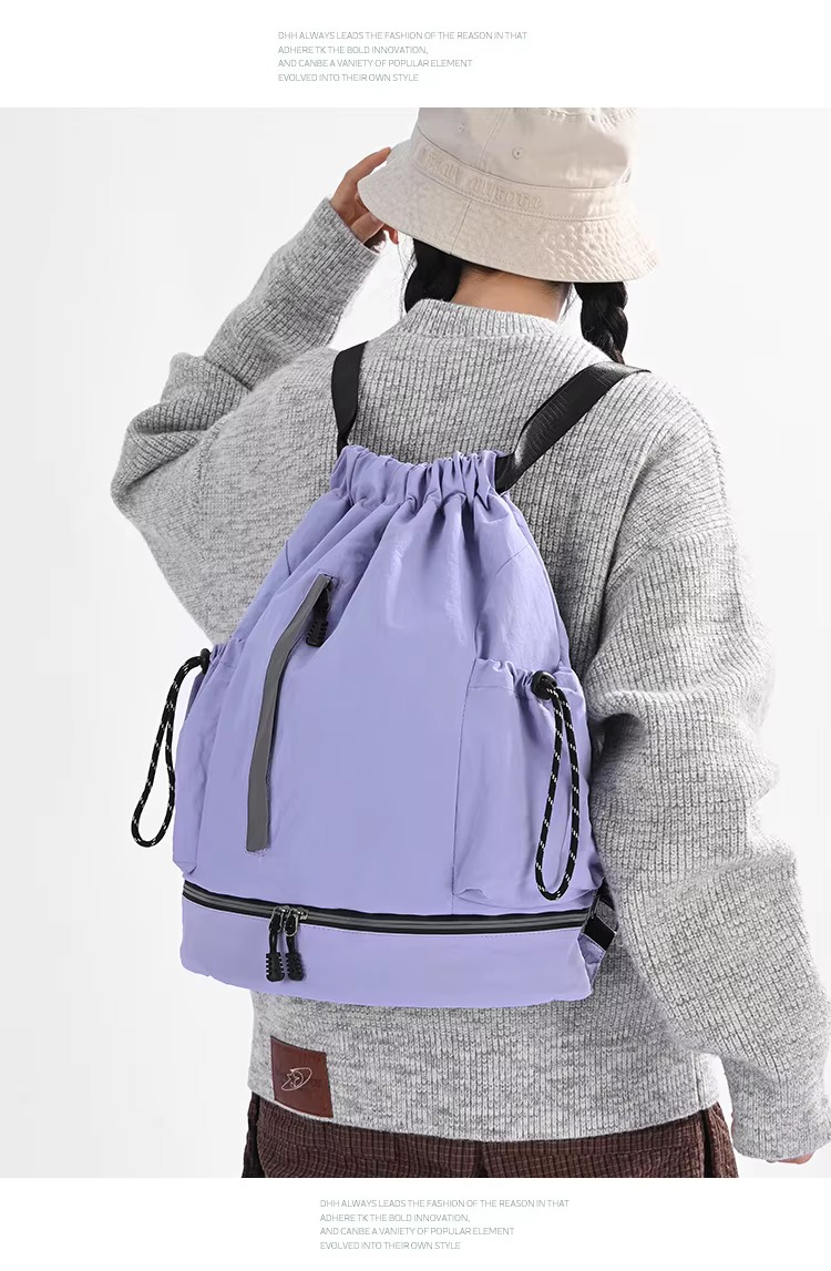 woman wearing purple backpack