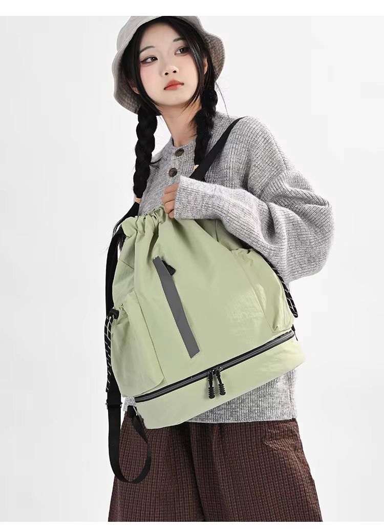 woman wearing green backpack