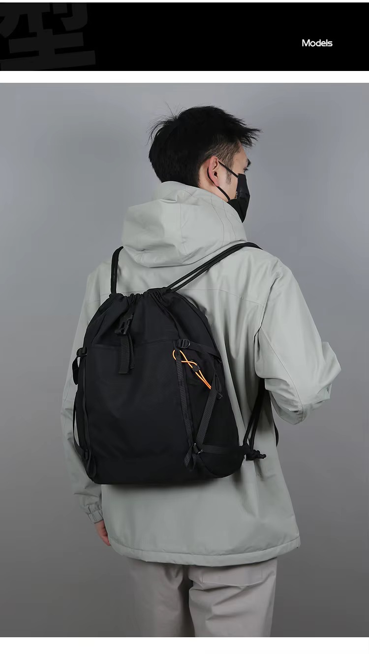man wearing black backpack