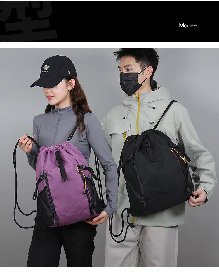 couple with purple and black backpacks