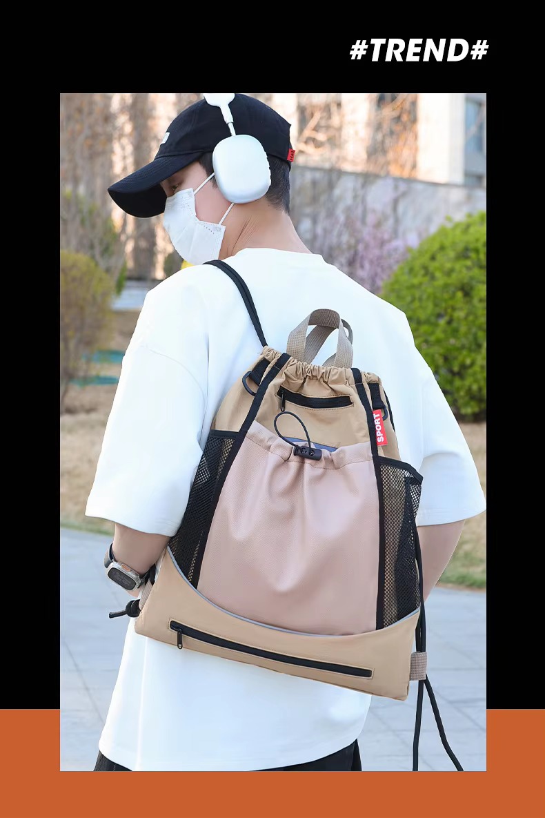 man wearing khaki backpack